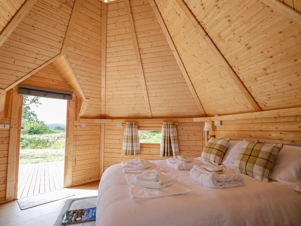 A bedroom with a bed and window at Little Luxe Lodges 1 in Kyle
