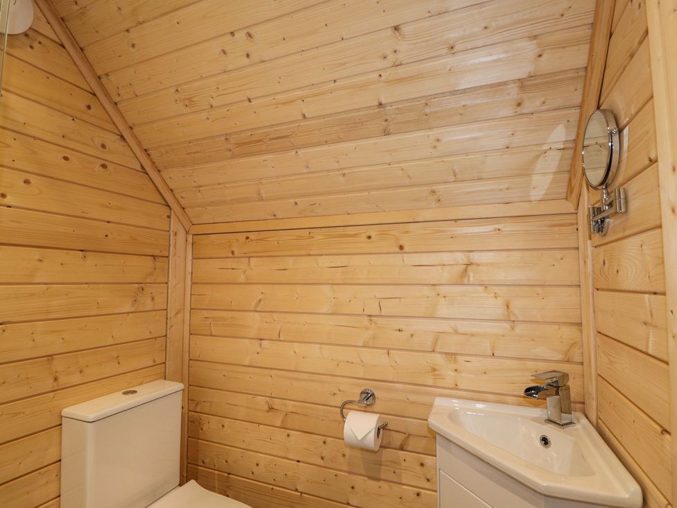 A bathroom with a sink and toilet at Little Luxe Lodges 1 in Kyle