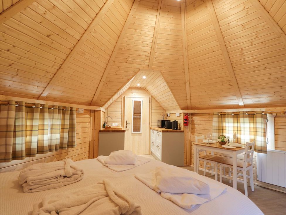 A room with a bed and kitchenette at Little Luxe Lodges 2 in Kyle