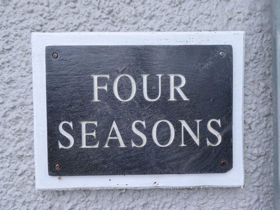 A nameplate with the text Four Seasons at Four Seasons in Humberston, Lincolnshire