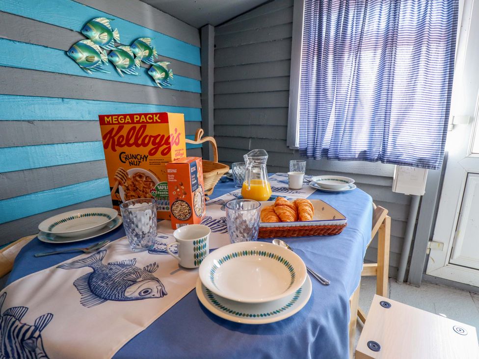 A kitchen table set with cereal, croissants, and drinks at Four Seasons Humberston, Lincolnshire