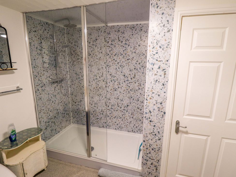 A bathroom with a shower enclosure at Four Seasons, Humberston, Lincolnshire