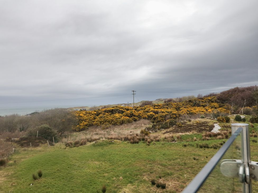 View of bushes and sea under cloudy sky at 2 Ard an Chuain Dunfanaghy