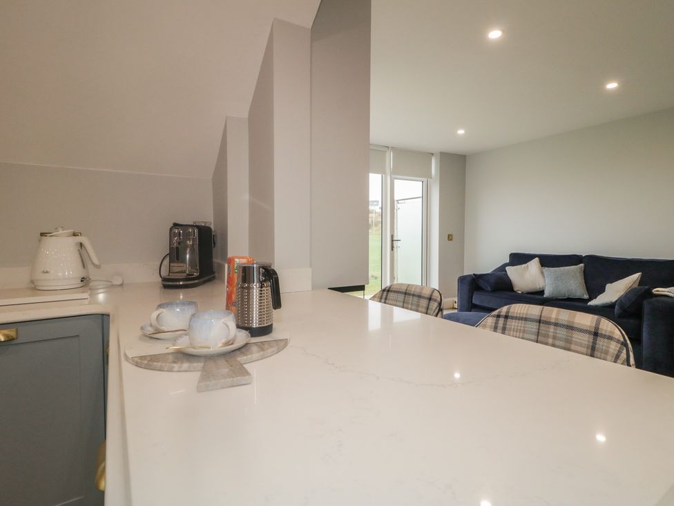 A kitchen with a kettle and coffee maker at 2 Ard an Chuain Dunfanaghy