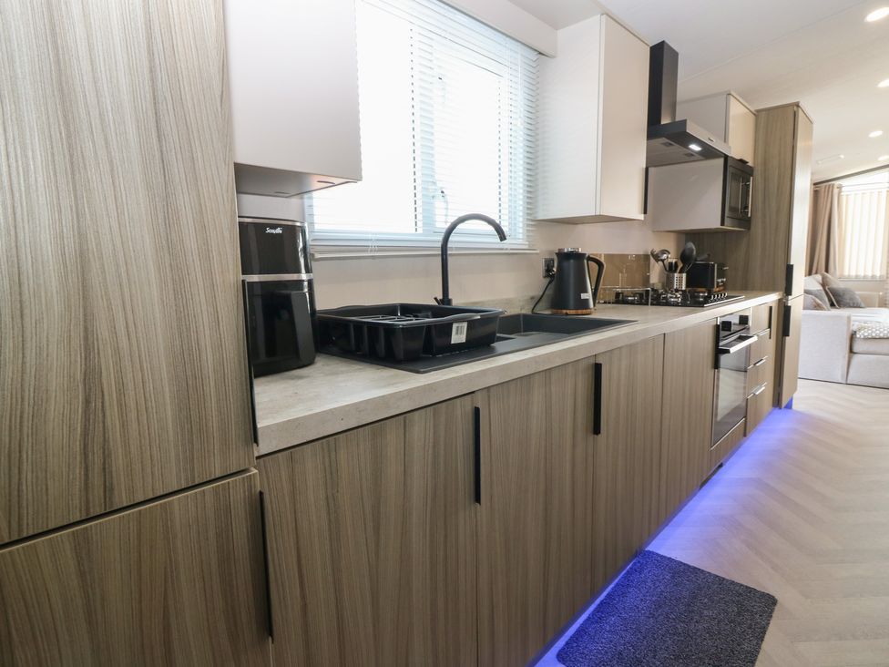 A kitchen with a sink and appliances at Plot 243 - Coldingham Bay Leisure Park Eyemouth
