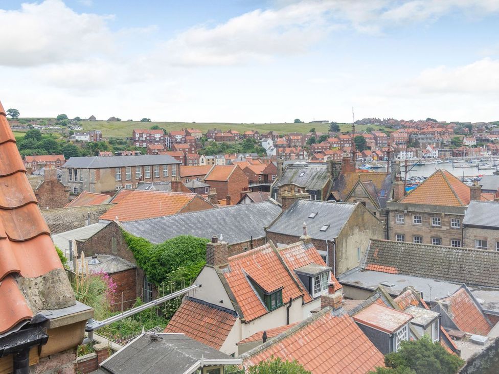 A view of rooftops and hills at The Anchorage in Whitby