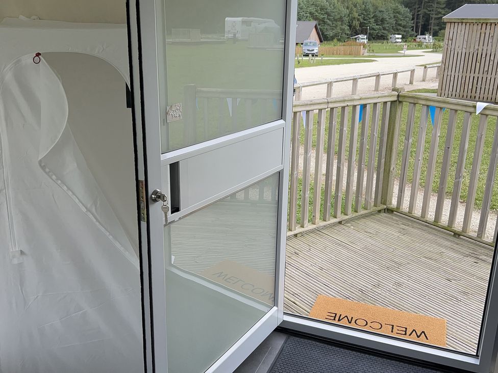 An entryway with a door opening to a welcome mat and outdoor area at Sherwood - Geodome, Mansfield