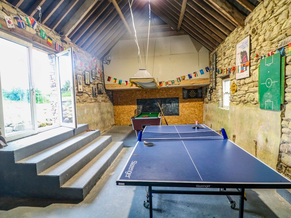 A games room with a table tennis table and pool table at Childwall Cottage TULLOGHER
