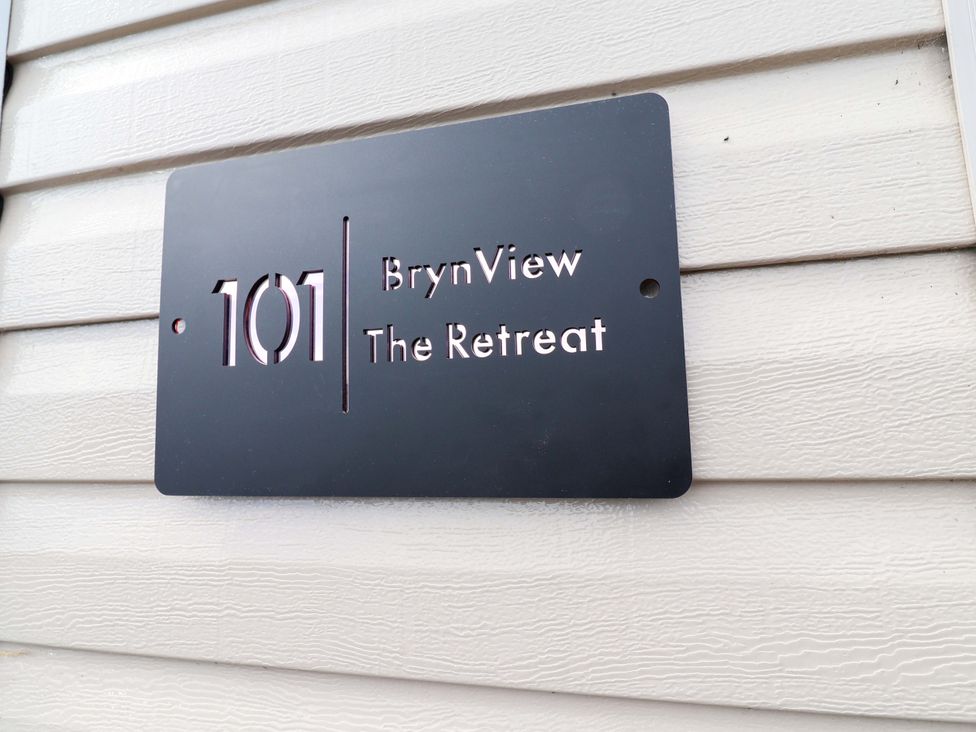 A sign displaying the name BrynView at The Retreat