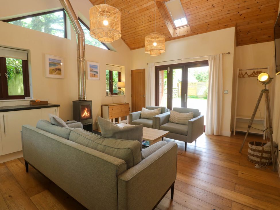 A living room with a sofa and coffee table at The Lodge at Lamburn