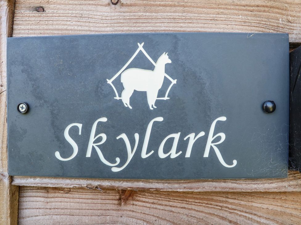 A sign with the text Skylark and a llama icon at Skylark in Loughborough