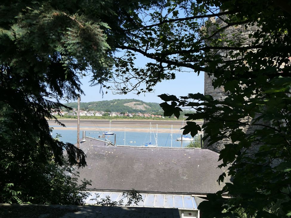 A view of boats on water and a roof from 3 Newboro Terrace in Conwy