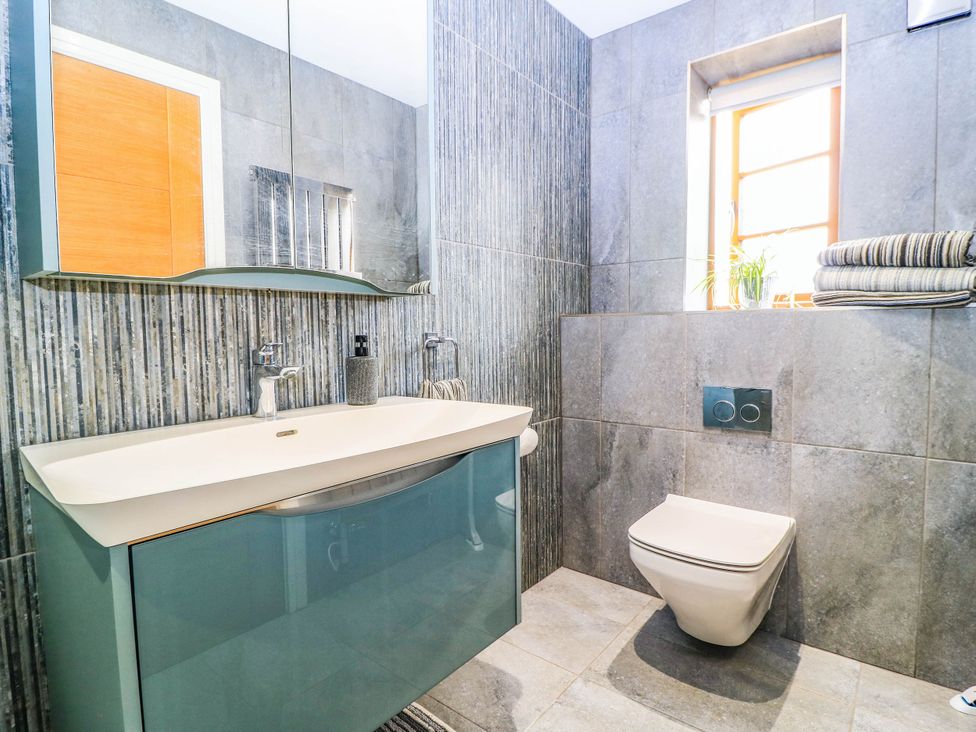 A bathroom with sink and toilet at Hazeldene near Harvington