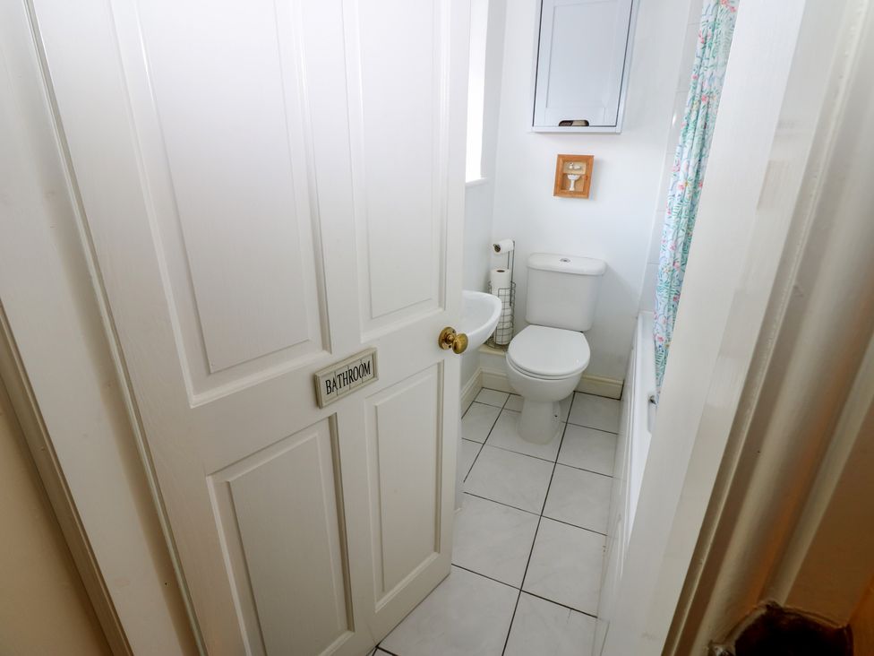 A bathroom with a sink and toilet at Wedgewood Cottage in Middleham