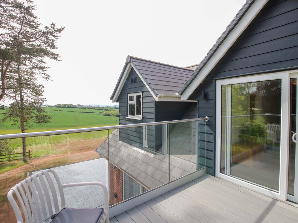 A balcony with a view at Westington Hall in Hatfield near Bromyard