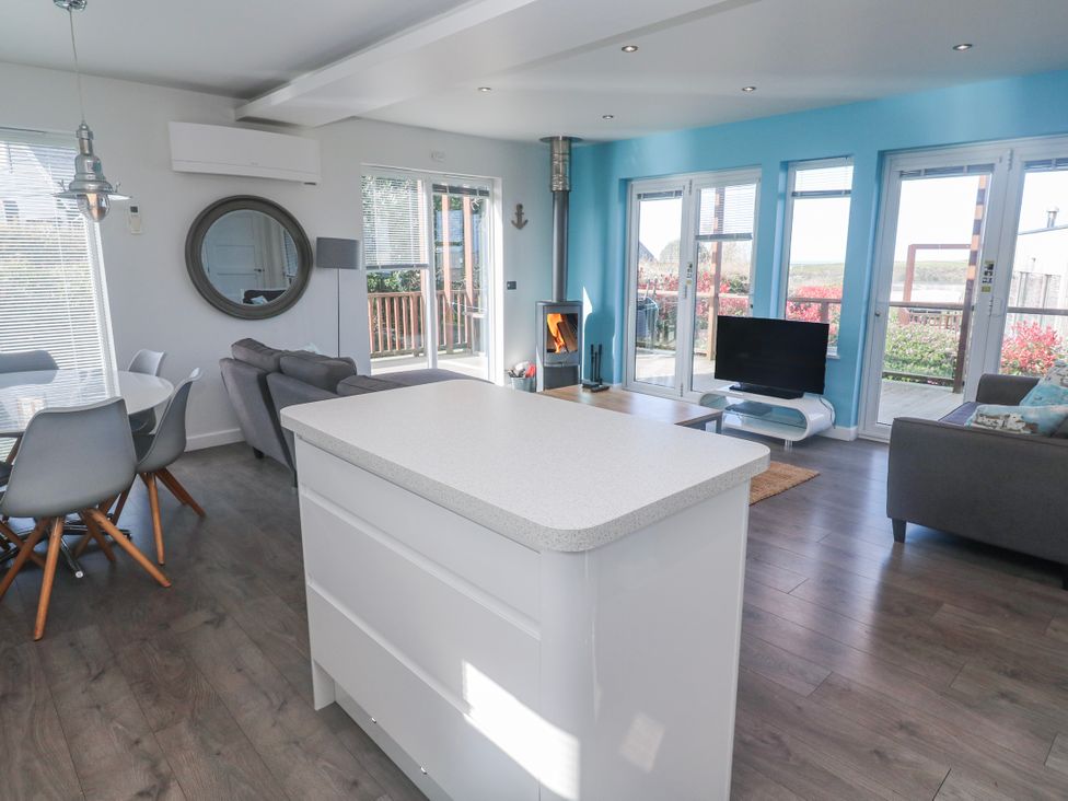 A living room with a sofa and television at Warleggan in Redruth