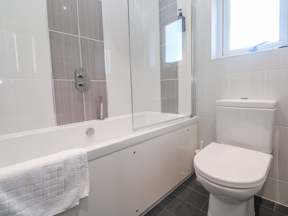A bathroom with a bathtub and shower at Warleggan Redruth