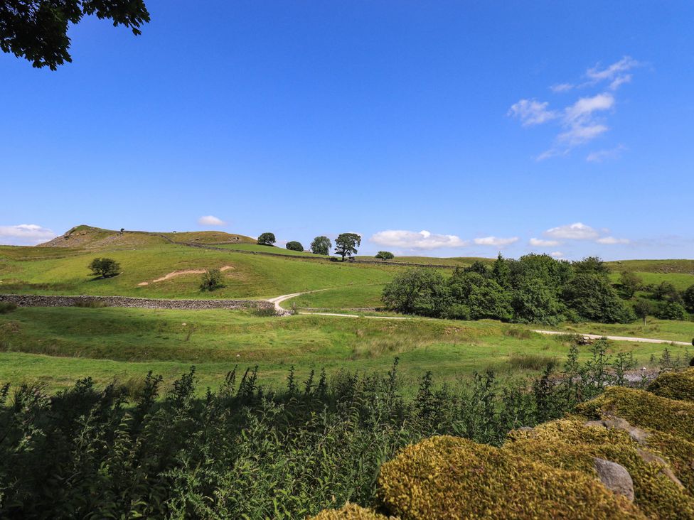 A landscape with hills and trees at Ragged Hall Barn in Settle