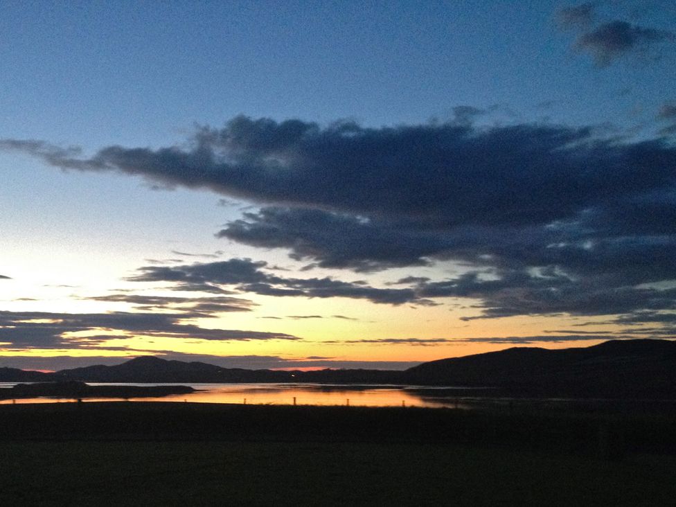 A scenic view of the sunset over water at Welcome to the wild Atlantic way Mulroy Bay