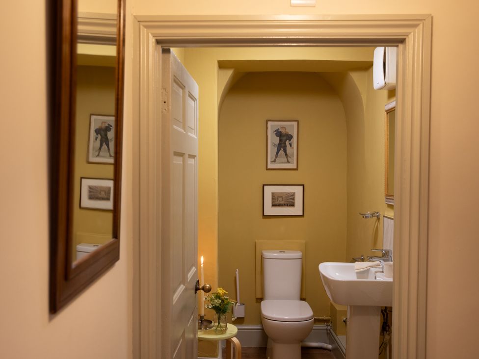 A bathroom with a toilet and sink at Bishop Lightfoot Cottage in Bishop Auckland