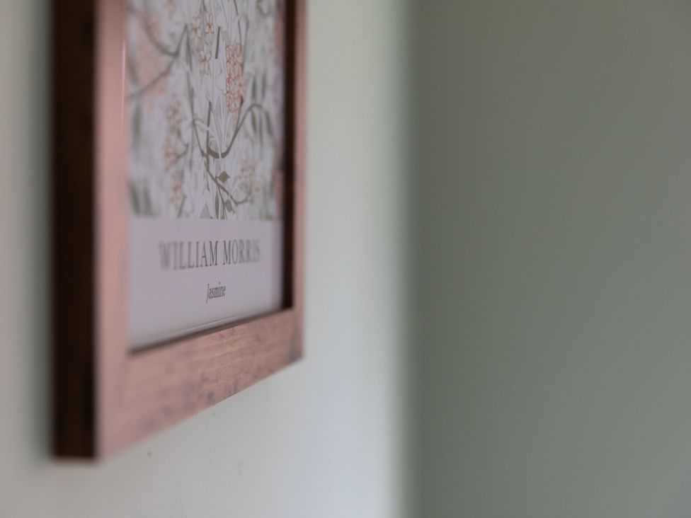 A framed picture on a wall at Sheriff's Tower Cottage - West in Bishop Auckland