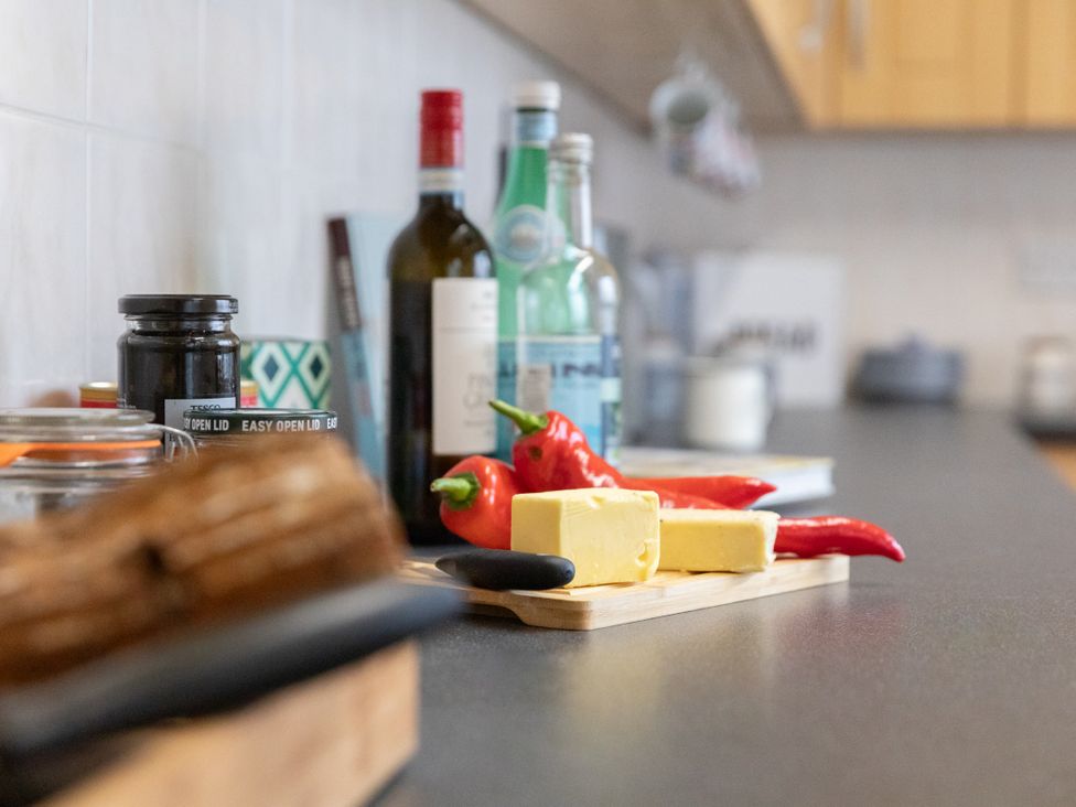 A kitchen counter with butter and chili peppers at No 2 Townhouse in Bishop Auckland