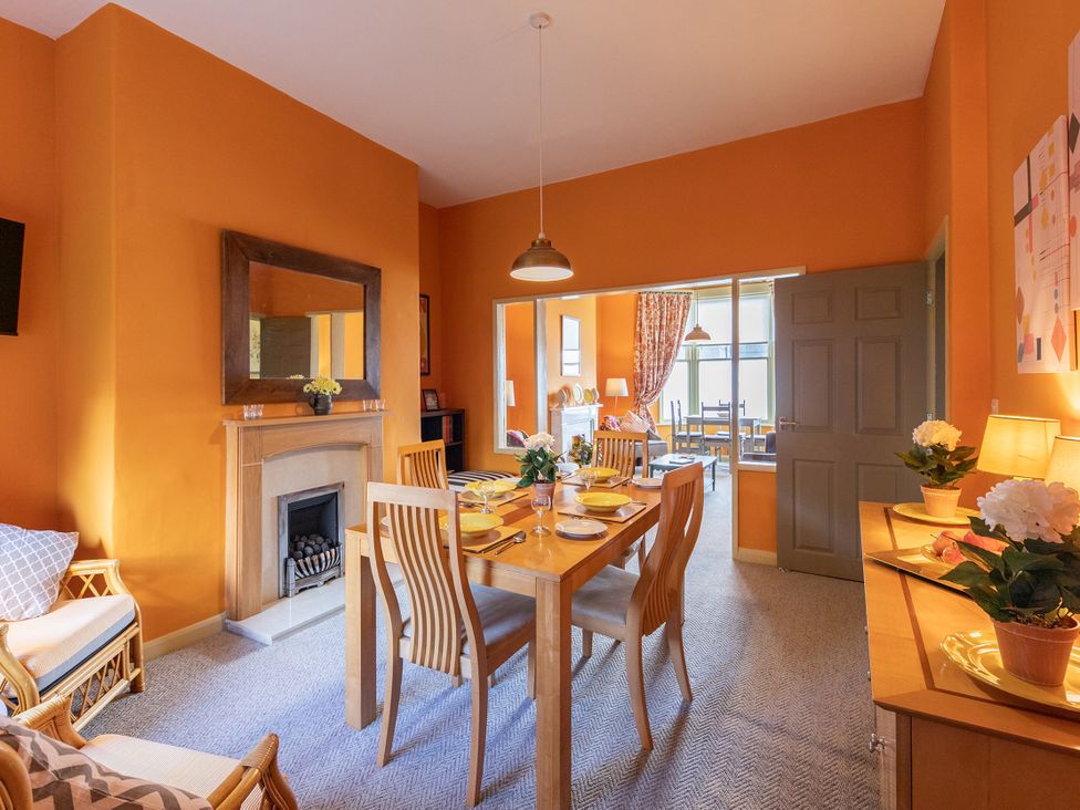A dining room with a table and chairs at No 4 Townhouse in Bishop Auckland