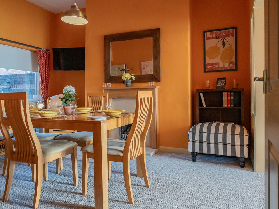 A dining room with a table set for four at No 4 Townhouse in Bishop Auckland