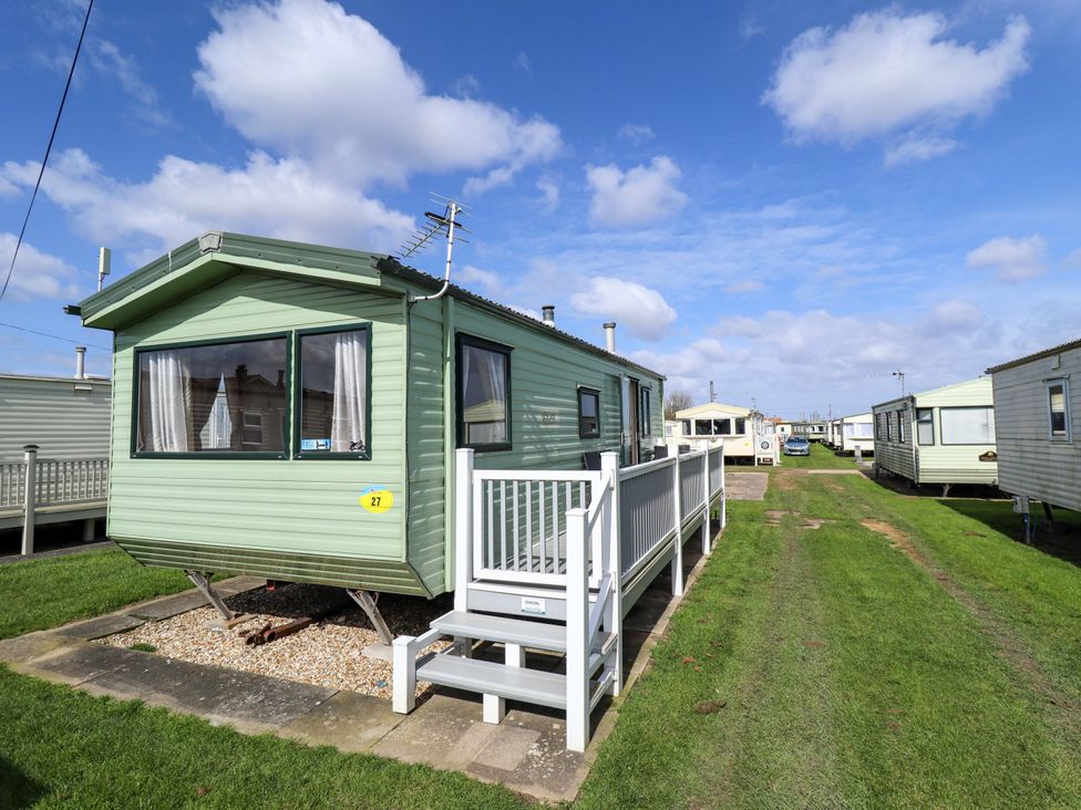 A caravan with steps and a pathway at The Seafront Cosy Caravan Ingoldmells