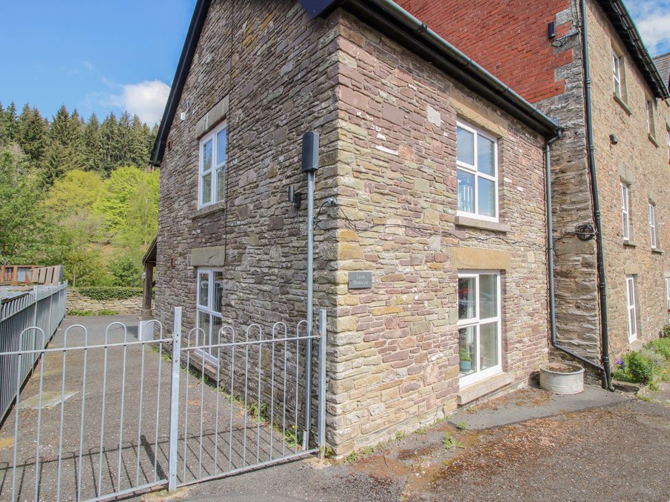 An exterior view of a stone building at Little Pentwyn in Clyro