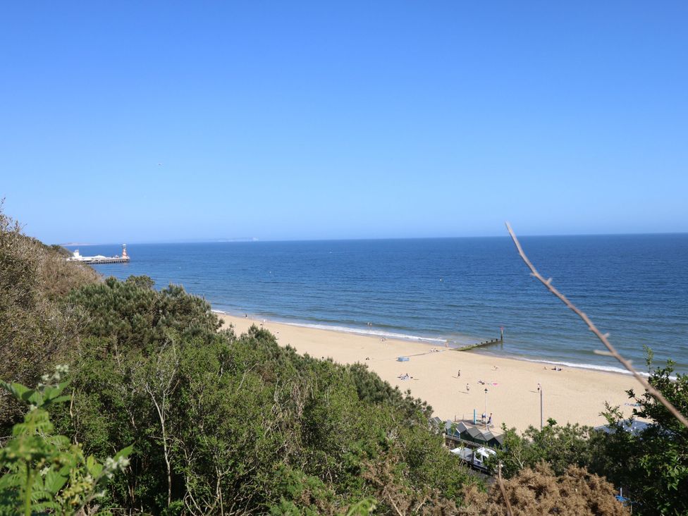 A beach and ocean view at Flat B in Bournemouth