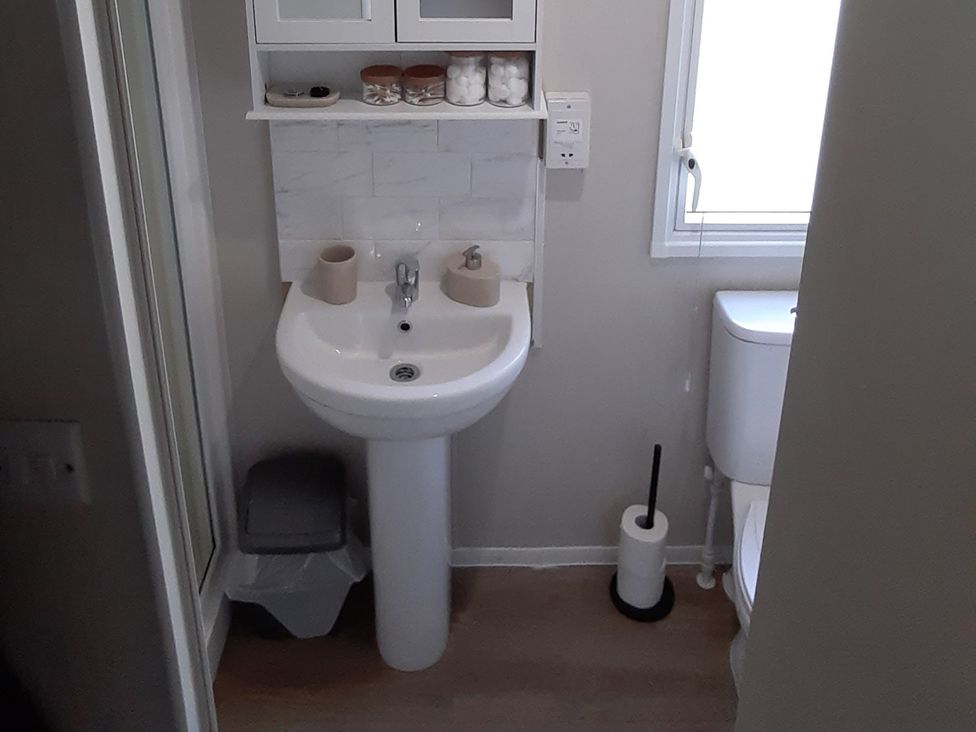 A bathroom with a sink and toilet at Josephine MB37, Newquay