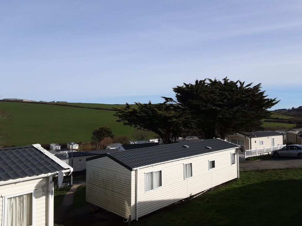 A view of caravans and trees in a field at Josephine MB37 Newquay