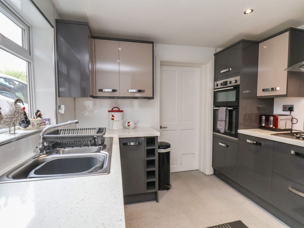 A kitchen with cabinets and appliances at 30 Prospect Hill Whitby