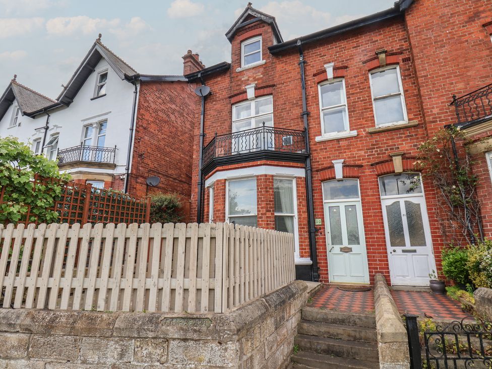 A house with a fence and balcony at 30 Prospect Hill Whitby