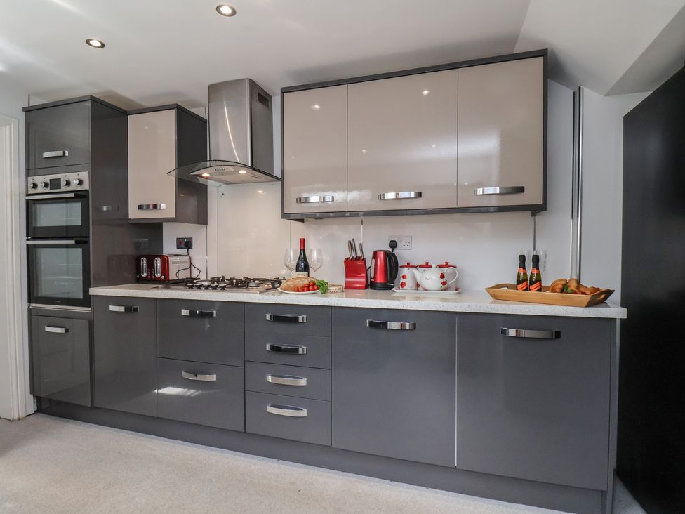A kitchen with appliances and a countertop at 30 Prospect Hill in Whitby