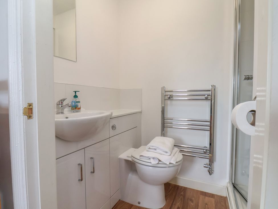 A bathroom with a sink and toilet at 30 Prospect Hill in Whitby