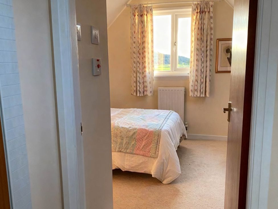 A bedroom with a bed and window at 1 Bed House - Central, Free Parking, Wifi, Stirling