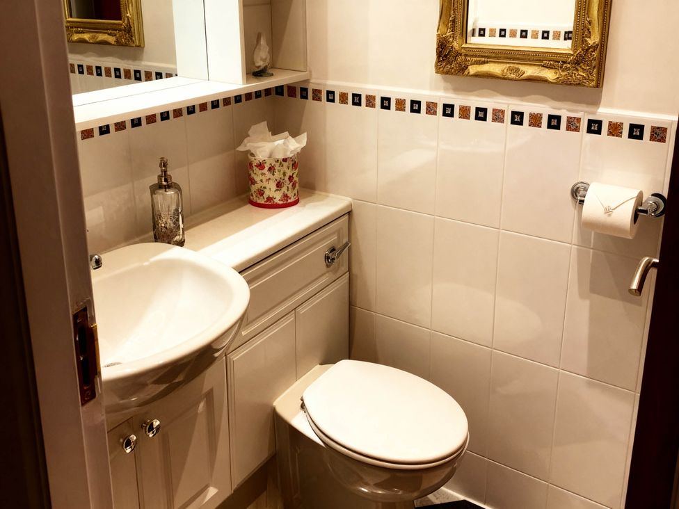 A bathroom with a sink and toilet at 1 Bed House - Central, Free Parking, Wifi in Stirling