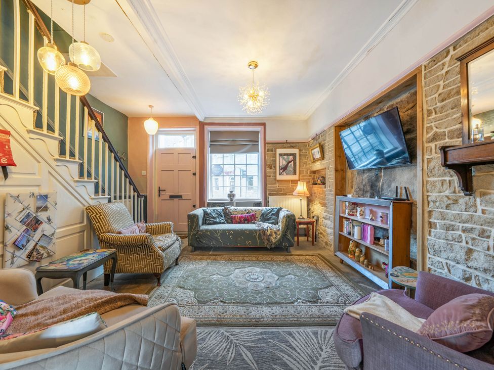 A living room with a sofa and armchairs at Hebden Bridge - House - Sleeps 8 - Pet Friendly, Hebden Bridge