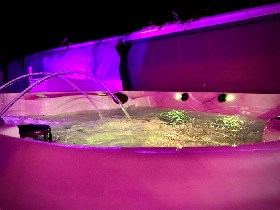 A hot tub with water jets at Family modern 3 bedroom hot tub house Blackpool