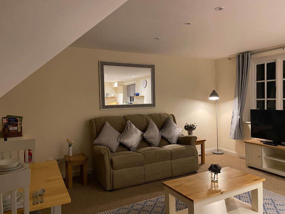 A living room with a sofa and coffee table at Apartment - Sleeps 2 - Pet friendly - Parking, Ludlow