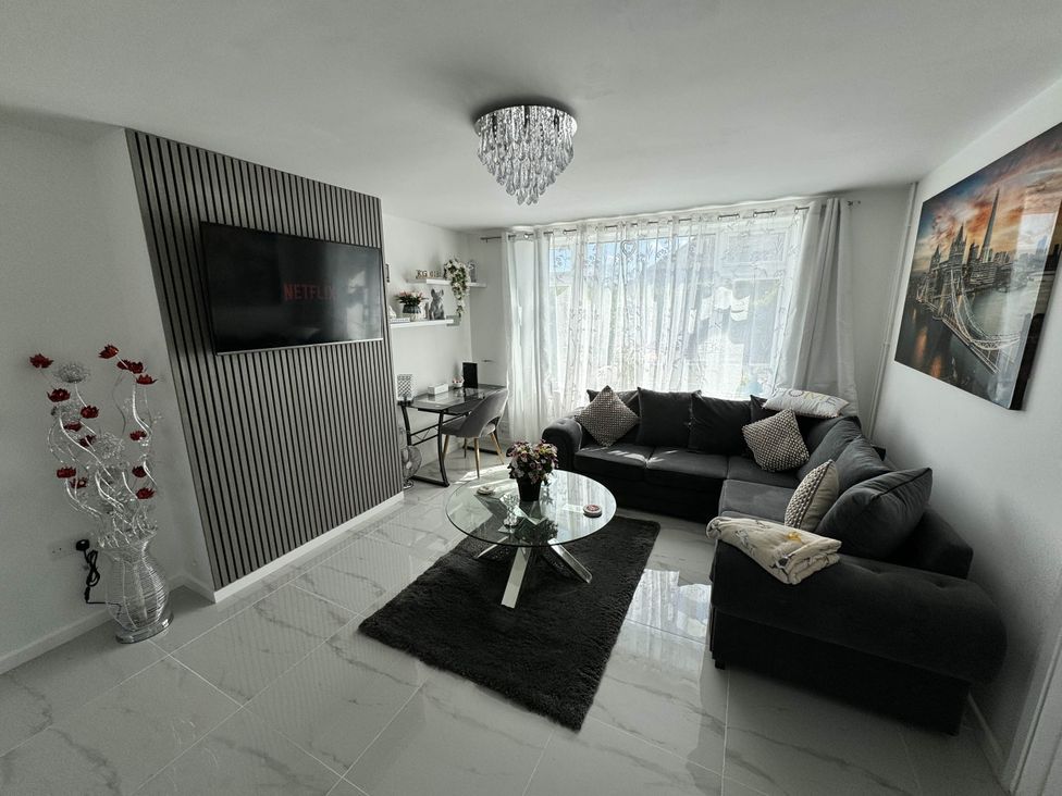 A living room with a sofa and coffee table at Modern 3-Bed Hideaway Near Westgate With Parking, Canterbury