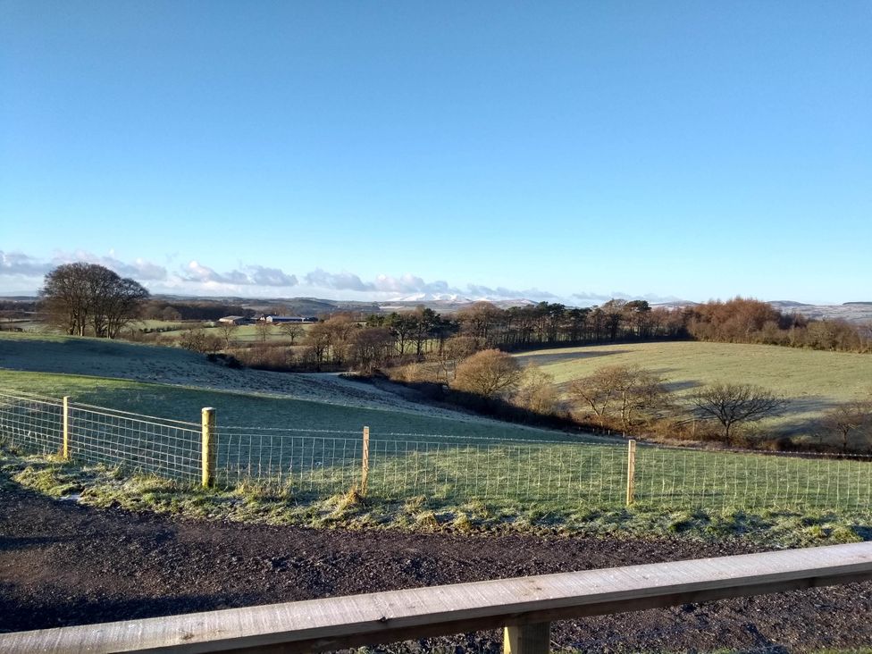 A scenic landscape view with fields and trees at Cleeves Cabins 2, Arran Luxury Lodge with hot tub, St. John's Town Of Dalry