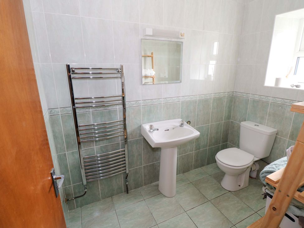 A bathroom with sink and toilet at Ocean View in Westport