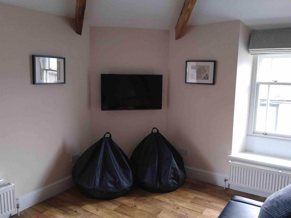 A living room with bean bags and a TV at Sedbergh Penthouse - KingBed - Tv - Wifi in Sedbergh