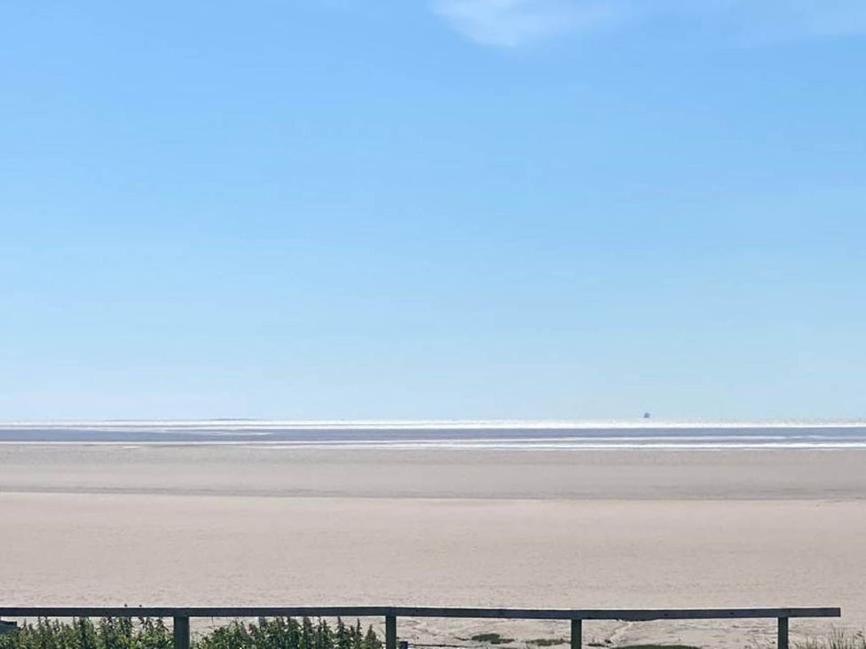 A view of the sea and sand at Beachside Lodge - Sleeps 6 - Pets ok - Parking in Heysham