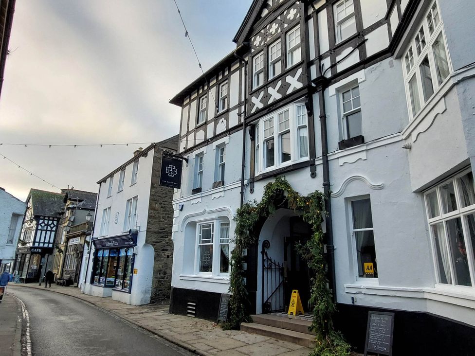 An exterior view of buildings on a street at Cosy Cottage for two in the centre of Sedbergh