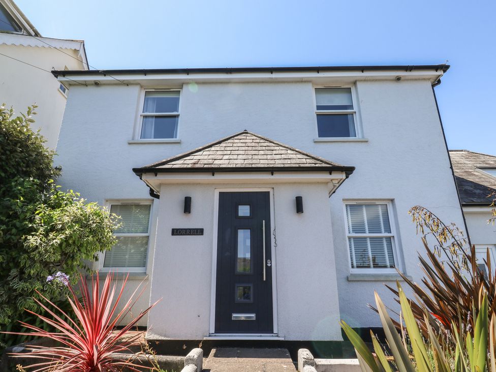 A house with a front door and windows at Lorrell in Salcombe