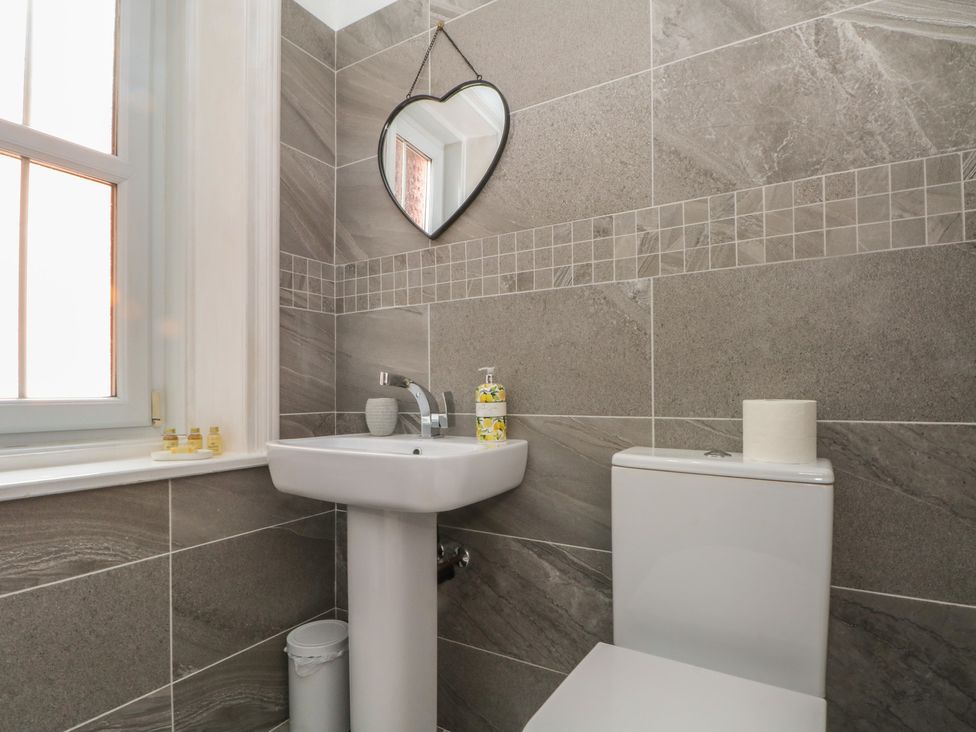 A bathroom with a sink and toilet at Apartment 2 in Lytham St. Annes